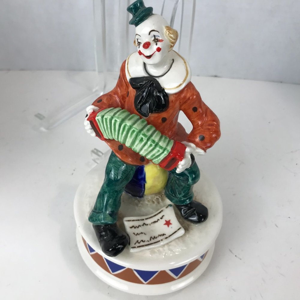 Hand painted ceramic clown music box signed by the artist